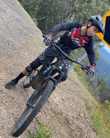 Aston Droomer riding his new bicycle. 